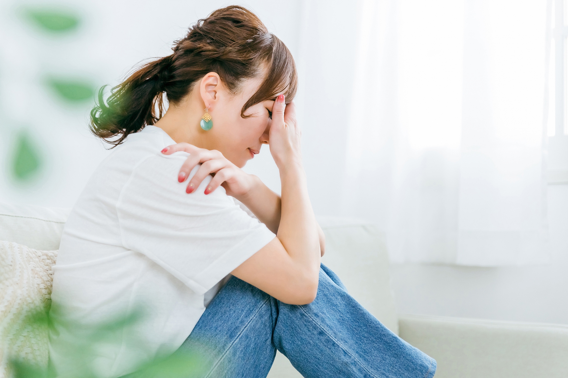 夫名義で悩む女性